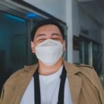 Portrait of an Asian man smiling with a face mask in Baguio, capturing a moment of the new normal.